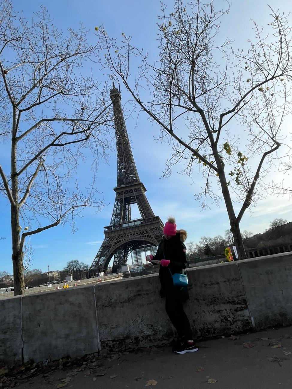 Reading by Eiffel Tower